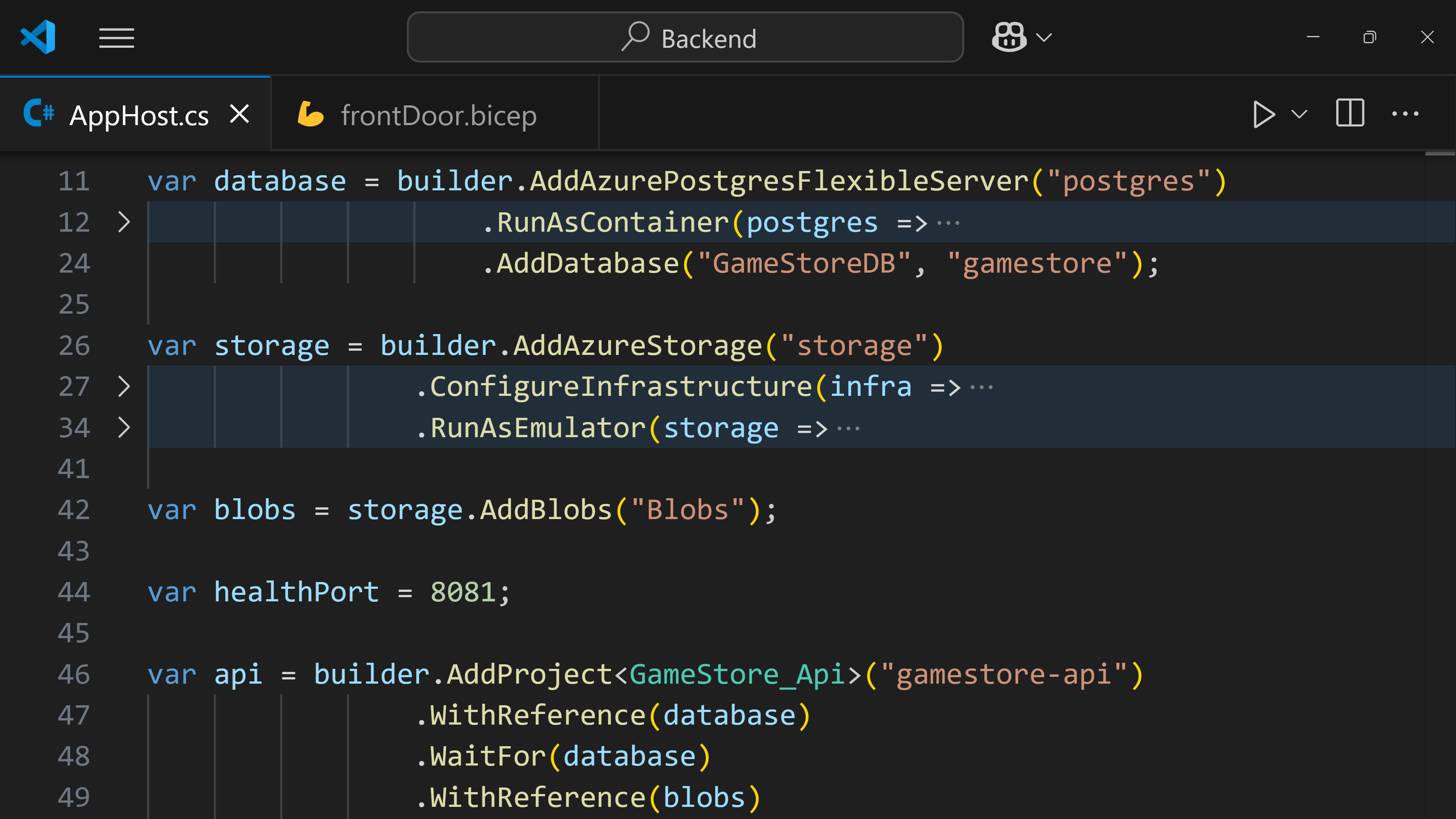 The Aspire AppHost in C#: AddAzurePostgresFlexibleServer, AddAzureStorage, ConfigureInfrastructure, and AddProject calls that double as the cloud deployment definition.